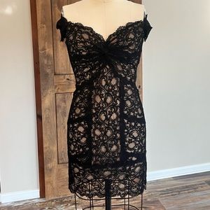 Nicole miller stretch lace dress. Size Large.  Black with nude lining